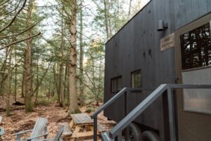 a trailer home in the woods
